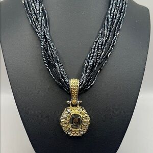 Elegant Black Beaded Necklace with Gold and Silver tone Pendant with Quartz